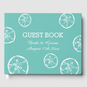 Beach wedding guest book with sand dollar design
