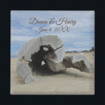 Beach Wedding Memento Driftwood Photo Oceanside Magnet<br><div class="desc">This beautiful magnet offers a beautiful way to offer your wedding guests a personalize memento from your special oceanside wedding. This photo captures a large piece of driftwood that has been washed up onto a Pacific Ocean beach and has slowly formed a hollow circle in it's center. The brown sand...</div>