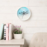 Beachaholic Watercolor Beach Clock<br><div class="desc">Wall clock features watercolor beach water sand and word "beachaholic" with decorative accent and flip flops.</div>