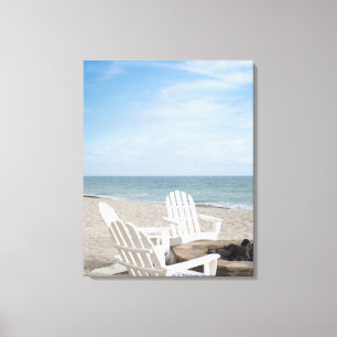 beachfront house with adirondack chairs and canvas print