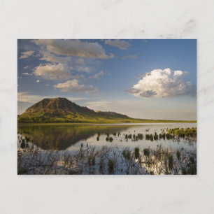 Bear Butte reflects into Bear Butte Lake near Postcard