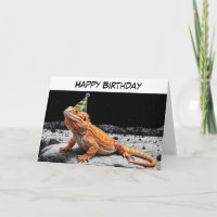 Bearded dragon wearing birthday hat birthday