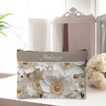 Beautiful 3D White Gardenia Wedding   Accessory Pouch<br><div class="desc">Discover our exquisite Accessory Pouch, adorned with 3D White Gardenia Floral designs and elegant gold accents. This stunning pouch features lifelike white gardenias that seem to bloom right off the fabric, complemented by luxurious gold touches that add a hint of sophistication. Easy to personalise with your name or give as...</div>