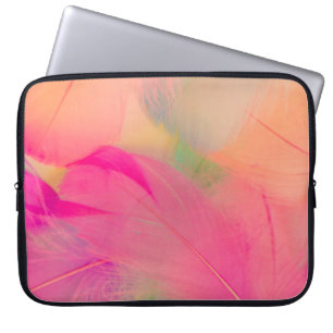 Beautiful abstract purple and blue feathers on whi laptop sleeve