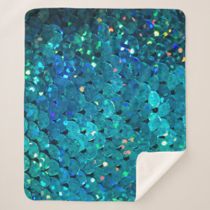 Beautiful and colourful sequins sparkling under th sherpa blanket