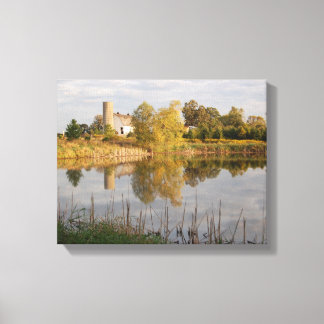 Beautiful Barn and Farm reflected in the Pond Canvas Print