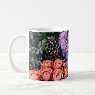 Beautiful blossoming flowers (roses, hydrangeas, c coffee mug