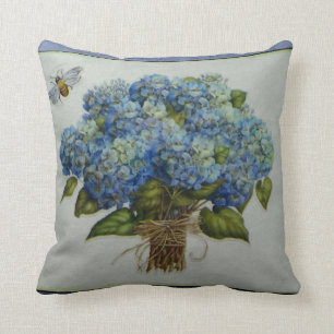 beautiful blue hydrangeas with a bee cushion