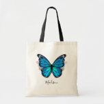 Beautiful Blue Watercolor 3D Butterfly Tote Bag<br><div class="desc">Create your own personalized butterfly tote bags on an elegant DIY template that is easy to add your monogram letter, name, initials, or short inspirational phrase/quote to. The rustic watercolor artwork illustrated by the artists Raphaela Wilson spotlights a beautiful blue monarch butterfly with a shadow beneath its floral pattern wings...</div>