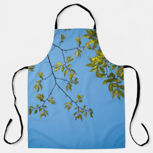 beautiful branch with green and yellow leaves hug apron