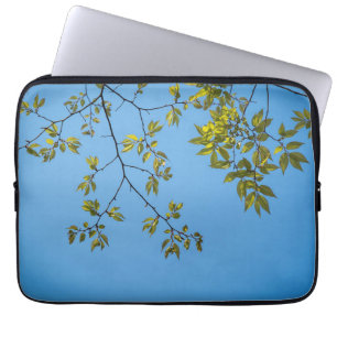 beautiful branch with green and yellow leaves hug laptop sleeve