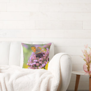 Beautiful butterfly on flowers cushion