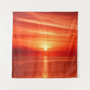 Beautiful colourful sunrise at the sea with dramat tapestry