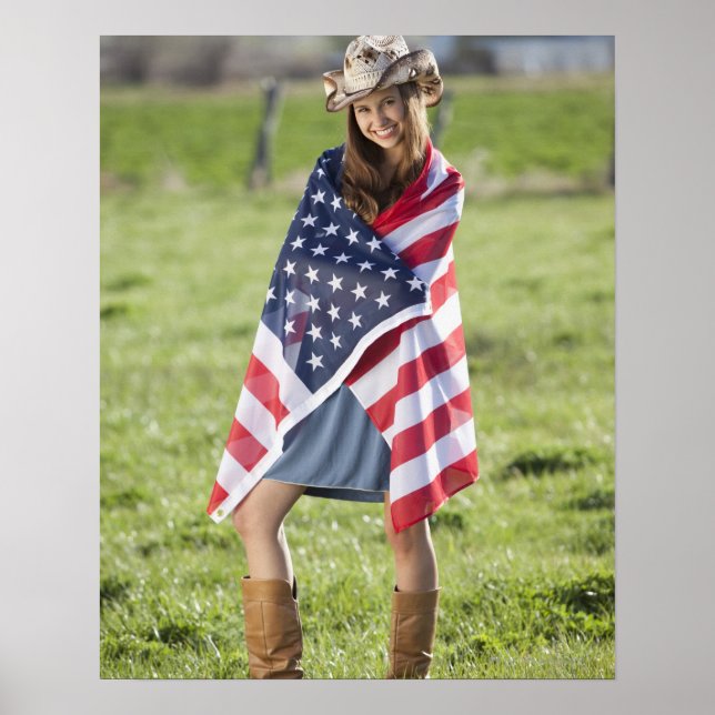 Beautiful cowgirl wrapped in American flag Poster (Front)