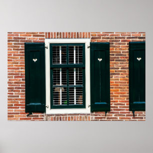 Beautiful dutch traditional houses. Brick wall wit Poster