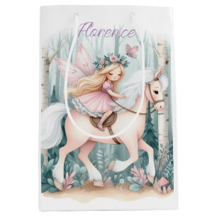 Beautiful fairy girl riding in an enchanted forest medium gift bag