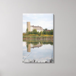 Beautiful Farm reflected in the Pond Canvas Print