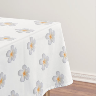 Beautiful Frangipani Plumeria Flowers on White Tablecloth