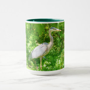 Beautiful great blue heron in the wild mug