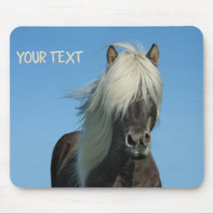 Beautiful horse under the blue sky mouse mat