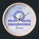 Beautiful Libra Astrology Sign Personalised Purple Clock<br><div class="desc">This pretty purple and lavender Libra clock features your astrological sign from the Zodiac in a beautiful sparkle like the constellations. Customise this cute gift with your name in cursive script for someone with a late September or early October birthday.</div>