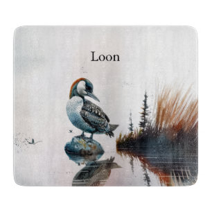 beautiful loon on a rock in watercolor cutting board