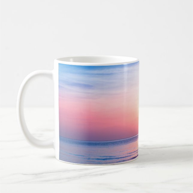 Beautiful morning sunrise, blue sea, pink sky, whi coffee mug (Left)