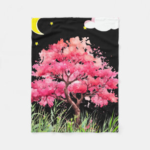 Beautiful night view of a cherry blossom tree fleece blanket