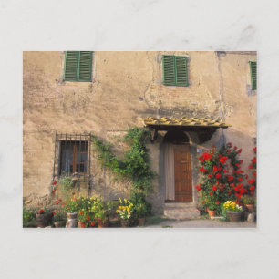 Beautiful old home with flowers at San Gimignano Postcard