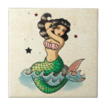 Beautiful Old School Mermaid Tile<br><div class="desc">Lovely Mermaid on the rock.  This amazing sea creature is luring travelling sailors of Seven Seas. Long black hair,  ruby red lips and fit body. Don’t need to mention her stunning voice – she is one of the most tempting girls of the ocean.</div>