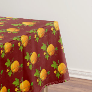 Beautiful Pumpkins on Autumn Red Tablecloth