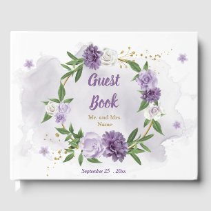 beautiful purple shades flowers greenery wreath guest book