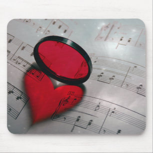 Beautiful red glass reflection forming a heart mouse mat
