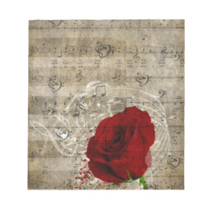 Beautiful red rose music notes swirl faded piano