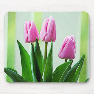 Beautiful spring pink tulip flowers, green leaves mouse mat