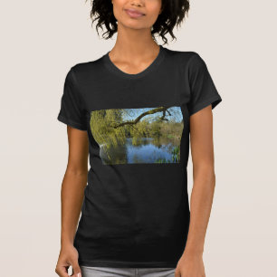 beautiful spring willow trees by water pond. T-Shirt