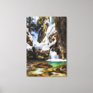 Beautiful stream in Gozd Martuljek end of winter  Canvas Print