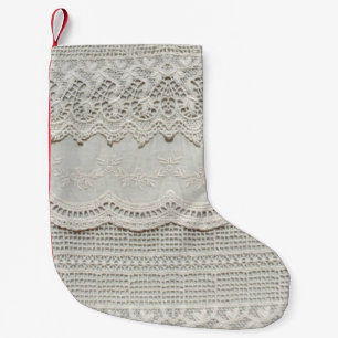 Beautiful, subtle, white laced textile close up. small christmas stocking