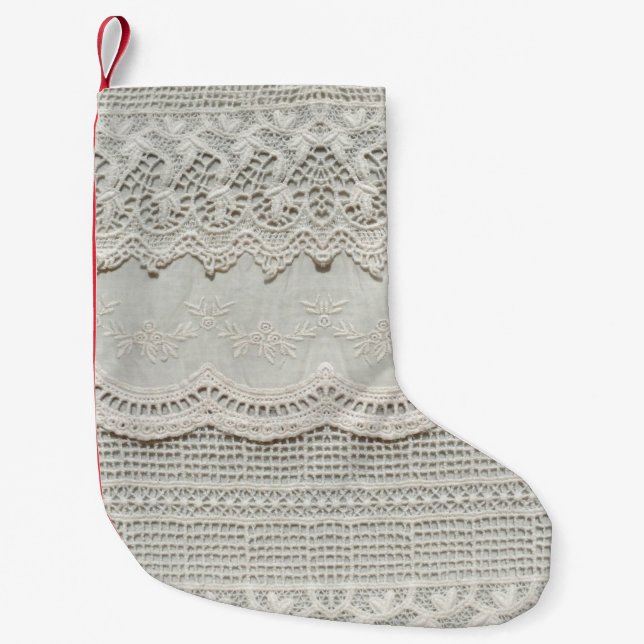 Beautiful, subtle, white laced textile close up.  small christmas stocking (Front)