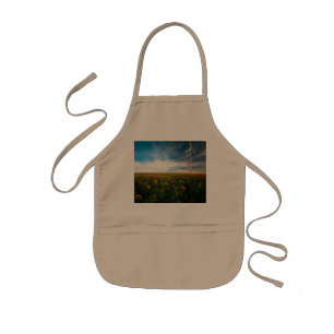 beautiful sun flowers field with cloudy blue sky a kids apron