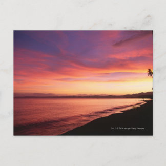 Beautiful sunset at the beach postcard