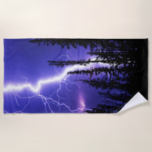beautiful thunder over the forest beach towel