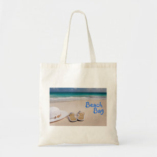 Beautiful tropical beach, flip flops sand and sea tote bag