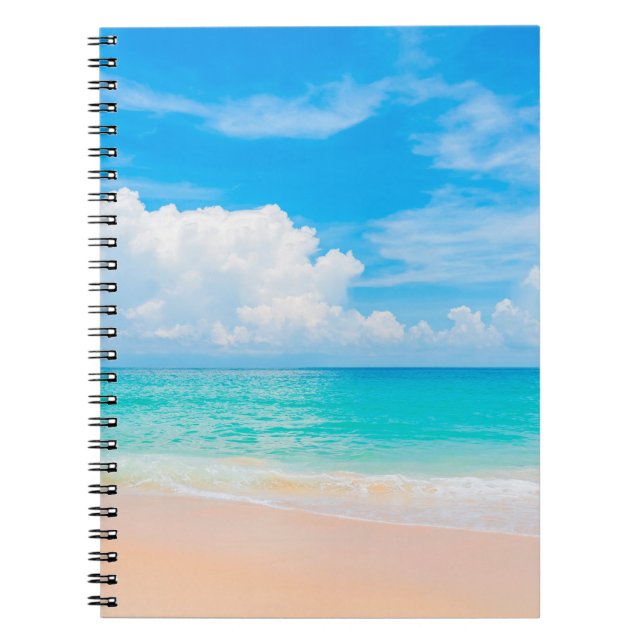 Beautiful tropical beach with blue sky and white c notebook (Front)