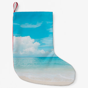 Beautiful tropical beach with blue sky and white c small christmas stocking