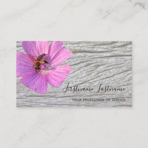 Beautiful violet pink flower blossom on wood business card
