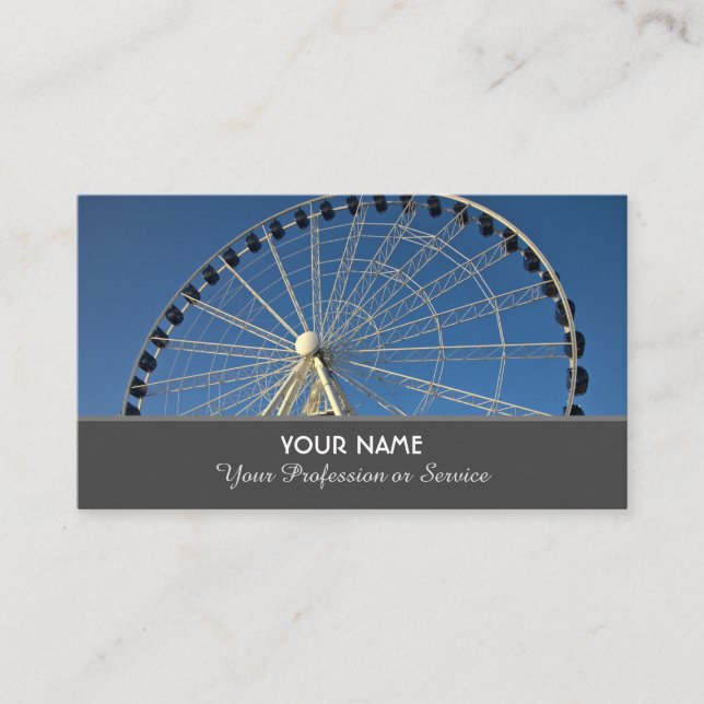 Beautiful white ferris wheel infront of blue sky b business card (Front)