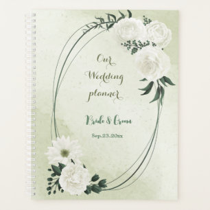 beautiful white floral greenery wedding planner