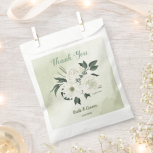 Beautiful white flowers green leaves wedding favour bags