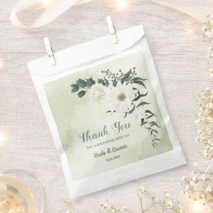 Beautiful white flowers green leaves wedding favour bags